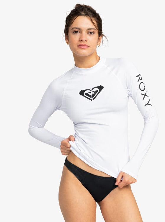 Be sun smart with our Whole Hearted Long Sleeve Rashguard. It's made with recycled stretch fabric to keep you protected and beach-ready with UPF 50 sun protection and a snug fit. Slip into it for surfing, paddle-boarding, kayaking, beach volleyball and more! Cool and comfy, it's sure to stay in constant rotation in your summer wardrobe. #BeSunSmart     ERJWR03547