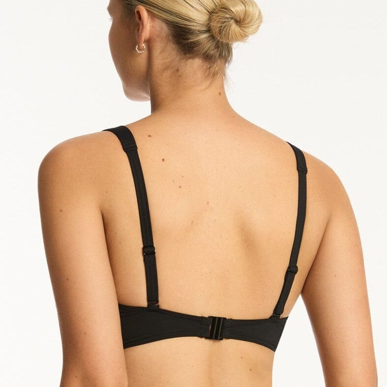 Discover superior support and style with the Eco Essentials Cross Front Bra. Expertly crafted with a hidden underwire bra and removable soft cups, your figure will be seamlessly sculpted while the adjustable straps and back E hooks guarantee a secure, comfortable fit for any cup size up to G. The heavy powermesh provides a body sculpting effect, allowing you to flaunt a silhouette that is as chic as it is supportive.     SL3324ECO