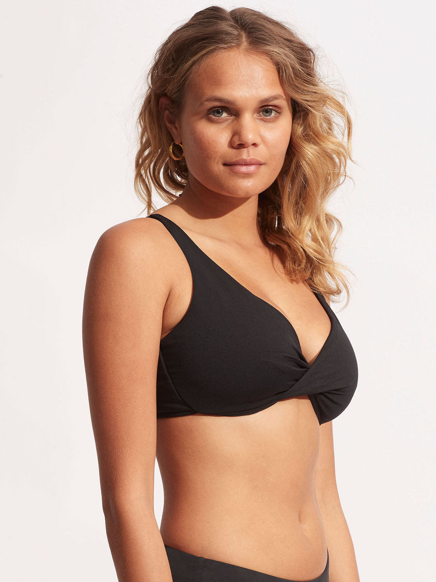 Flatter your bust with the gorgeous Wrap F Cup Bikini Top! This feminine and flattering top provides continuous underwire support and a beautiful twist front detail. Plus, adjust the straps to wear them either parallel or cross-back style with the adjustable E-hook back closure, and you'll be ready to rock the beach like a mermaid!    3219F942