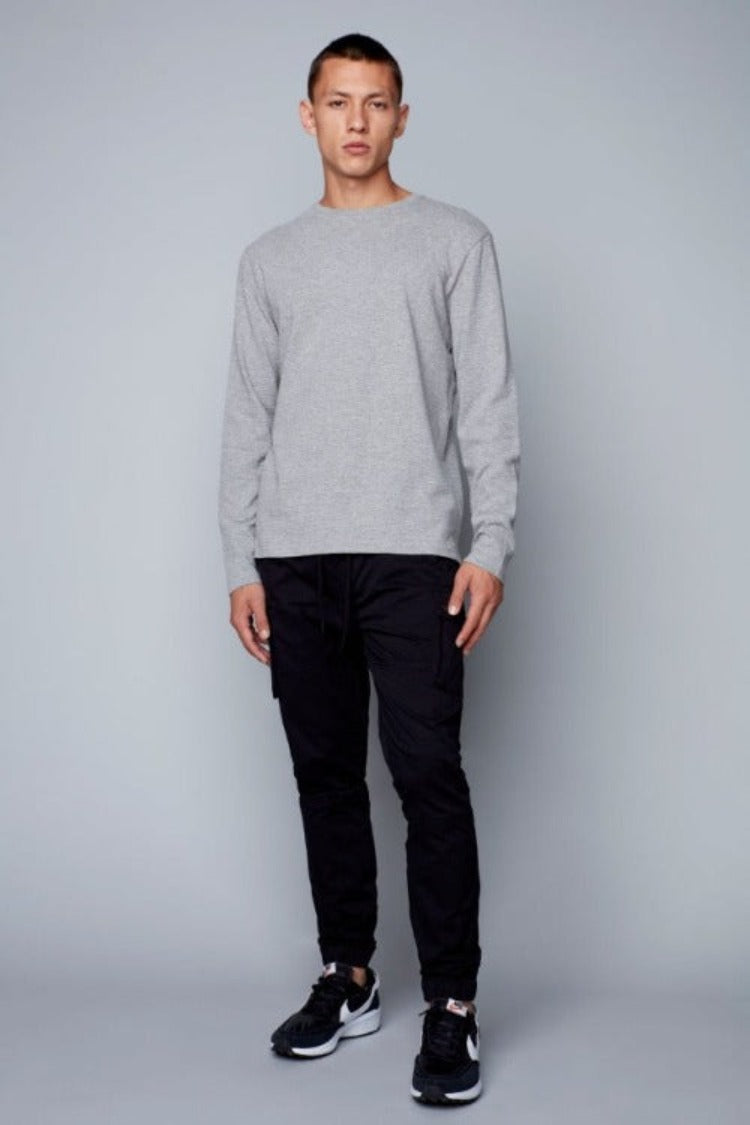 Look great and feel fantastic in this 'all way' stretch ribbed long sleeve featuring a split hem and super stylish, slightly longer back. Available in both light grey and olive, sizes Small to XX-Large.