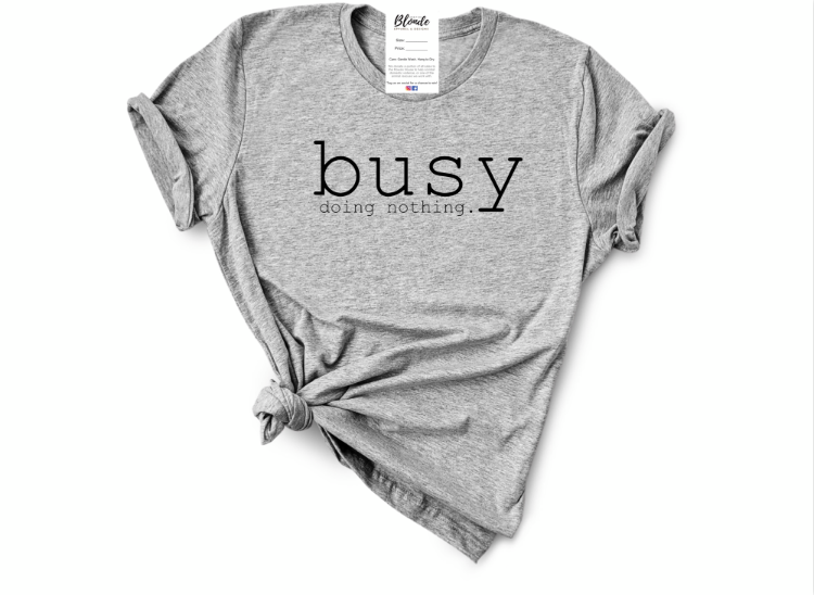 Make a statement in style with the Busy Doing Nothing Tee! In your choice of solid or heathered colors, this relaxed unisex-fit tee is soft, comfortable, eco-friendly and 100% sweatshop-free. Plus, for every purchase, we donate to animal rescue and Rowan House Shelter to help fight domestic violence. So don’t just stand around - get the Busy Doing Nothing Tee today!