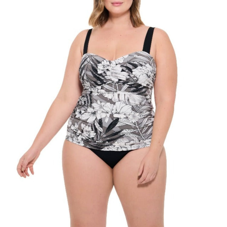 Flaunt your curves in this stylish Shirred D Cup Tankini! Its tummy tamer tech promises a flattering fit with adjustable straps and pullover style so you can take on the beach waves in comfort. Don't worry, it won't give you the shirred look! So what are you waiting for? Dive into this fun summery look!