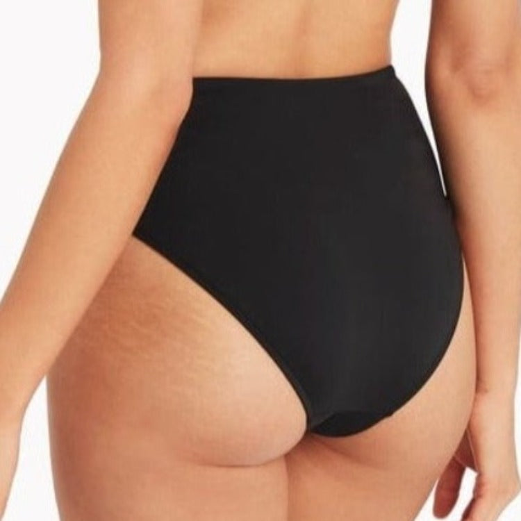 Turn heads in this sassy & stylish Black Botanica C/D Cup Bikini! With removable soft cups for custom fit & adjustable e-hook, you can be sure your curves will be accentuated while still secure & comfortable. Powermesh lining gives you the support you need so you can swim, strut, & slay with confidence in this seriously fab bikini! SL3434BO / SL4491ECO