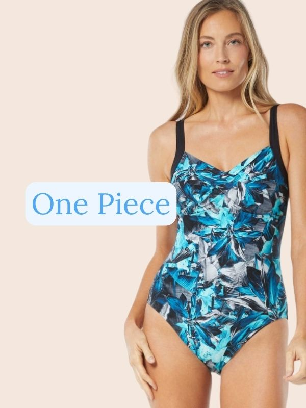 Blonde wearing a blue patterned one piece with a sweetheart neck line