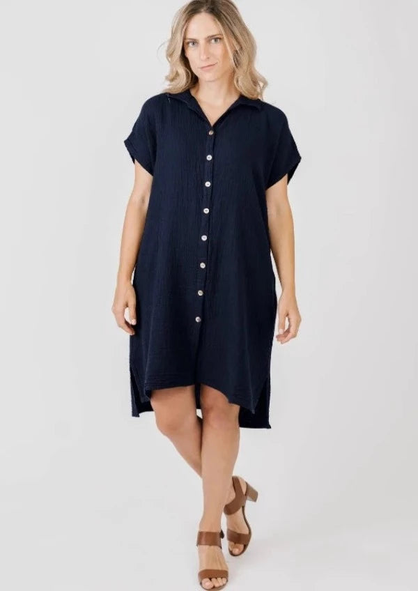 Enjoy comfort and convenience with the Shannon Passero Shirley Dress! Made with lightweight, gauze cotton for a breezy feel, this button-down dress features chic pockets for your essentials. It's the perfect mix of style and functionality!         1028