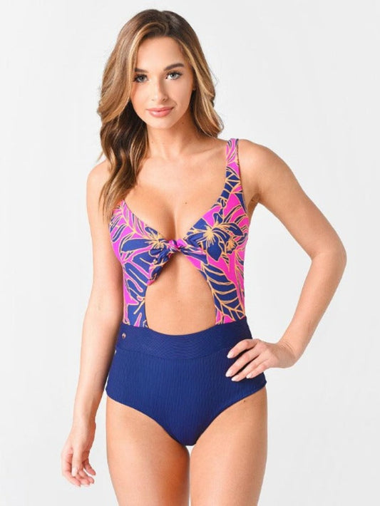 Take your swimsuit game up a notch with this blueberry sherbet-colored, reversible one-piece! Show off your bod with a front cut-out and cheeky bottom coverage. Tie it up for a customizable fit - the possibilities are (endlessly) delicious!