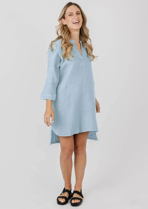 Dress to impress with the Lorraine Dress! Its V-neck, 3/4 sleeves, and hi-lo hem make it timelessly stylish. But the real kicker? Its pockets, giving you a place to store your essentials and make a statement. Walk into the room and all eyes will be on you!   5052