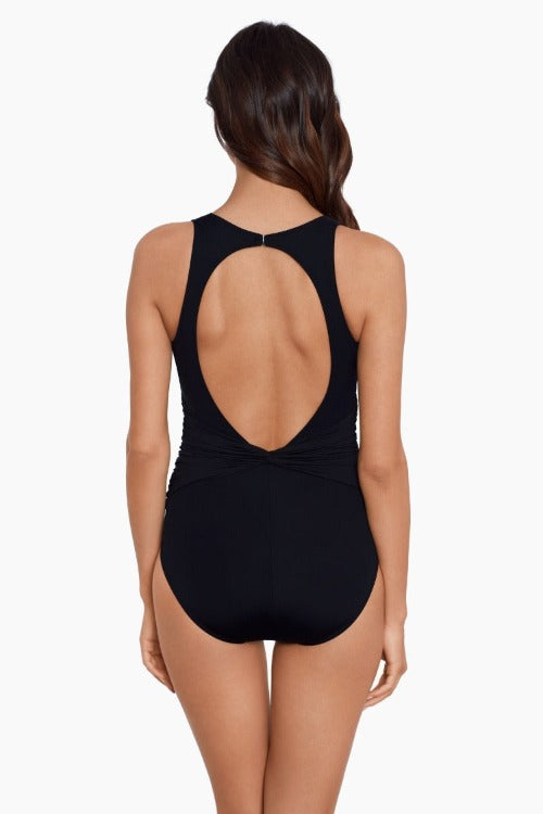 Stun in the Valerie One Piece Swimsuit from Magicsuit Swimwear! A sizzling mix of gorgeous solids and chic control and support will have you looking and feeling like a million bucks—confidently stylish from all angles. Plus, its wireless bra support and removable soft cup padding means it can accommodate up to a D-cup, giving you comfort and coverage.