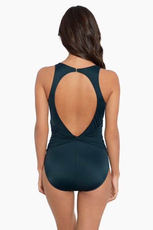 Stun in the Valerie One Piece Swimsuit from Magicsuit Swimwear! A sizzling mix of gorgeous solids and chic control and support will have you looking and feeling like a million bucks—confidently stylish from all angles. Plus, its wireless bra support and removable soft cup padding means it can accommodate up to a D-cup, giving you comfort and coverage.