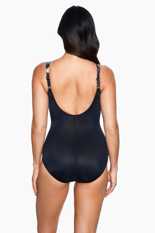Look 10 pounds lighter on the beach in 10 seconds! Slip into the Miraclesuit Oceanus One Piece for pure body-shaping perfection that will keep you confidently looking your best. Enjoy a V-neckline, adjustable straps, and a scoop back that wraps you in comfortable control fabric and LYCRA XTRA LIFE Spandex for a long-lasting fit. Plus, the cleverly draped fabric will conceal your tummy! Time to dive on in!