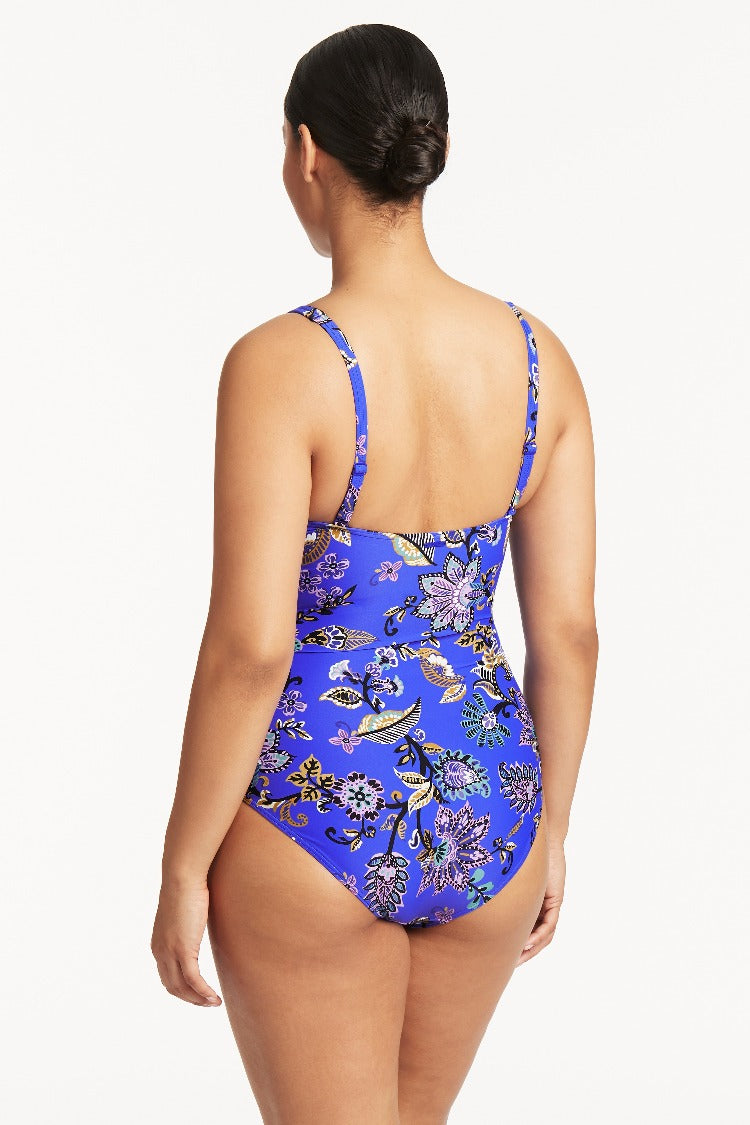 Escape the ordinary with our Sea Level Martini Cross Front Multifit One Piece! The Carnivale collection is perfect for free-spirited babes who want to boogie all summer long. Feel good about your swim look with over 70% Eco recycled material... you'll be lookin' wicked while doin' some good!