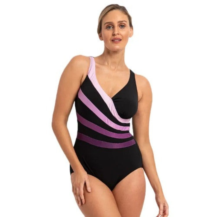 Let your style take a dive into the pool with the Fan Splice One Piece! Show off your stripes in this ombre diagonal swimsuit featuring a scoop back, modest cut seat and leg, and a v-neck for a flirty finish. 100% polyester ensures your swimsuit won't fade too soon - with a pool life of 300+ hours your style will certainly make its mark!