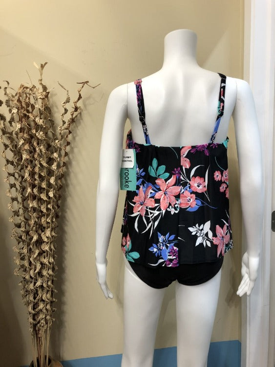 Enjoy a day in the sun and look fabulous with this Flyaway One Piece! With soft cups, adjustable straps, v-neck, tummy control, and a colorful flowy overlay, this cute plus size swimsuit is the perfect way to stay stylish and comfortable. Get ready to rock the beach this summer with a splash of fun and femininity!     5528576X