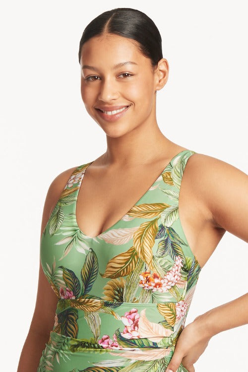 Discover paradise with our Lost Paradise D/DD One Piece! It's perfect for cups D-DD with an underwire sheath and removable soft cups so you can customize your level of comfort and support. With adjustable & convertible straps, side boning and powermesh lining for front & back support, you'll be sure to rock this beach-wear – no matter what shape or size! (Woo-hoo!)     SL1531LP