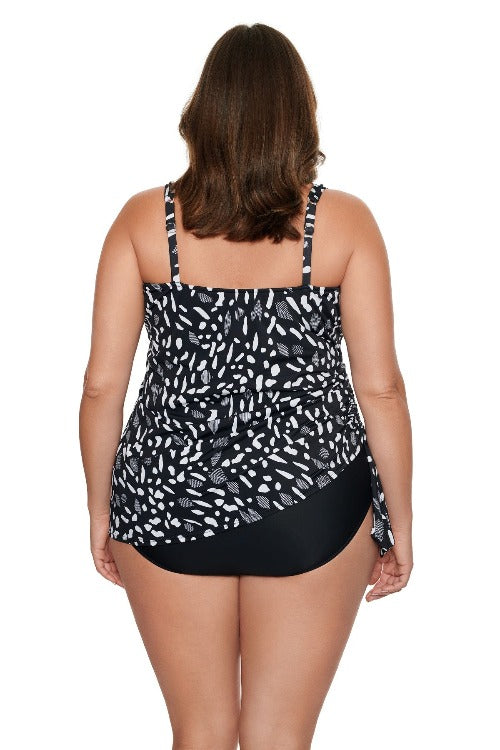 Be the belle of the beach in the Penbrooke Women's Jungle Dot Tie Faukini One Piece Swimsuit. Instantly create a flattering figure with the adjustable straps and side tie, tummy control and soft cups. Plus, this one-piece suit features a conservative cut bottom, so you can feel secure even when going for a dip! Keep it cute with the dot overlay - you won't find a more stylish way to make a splash!