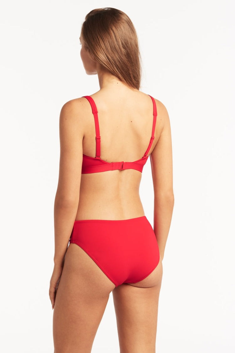The Cross Front Mid Rise Bikini has you covered - literally and figuratively! Made from 70% recycled materials and inspired by the 70s, this bikini will let you relax in style and sustainability - now THAT'S something to shout about!