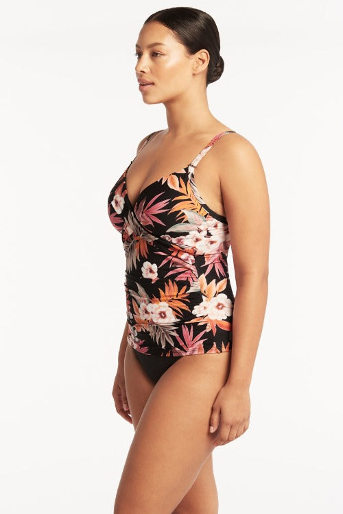 Embrace your curves in this Escape DD/E Cup Twist Front Tankini! This flattering piece offers underwire bra sheath with removable soft cups, so you can make the desired fit for your bust! Best of all, adjustable and convertible straps let you customize this tankini for even more comfort. Boning and powermesh lining give extra front & back support, and the retro high waist bottom is perfect for a fashionably secure fit. Get ready to love life on the beach!     SL3480ES/4140ECO