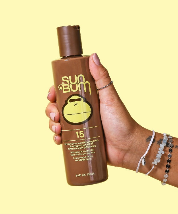 Sun Bum Browning SPF 15 Lotion  Style: 2550102  Get that beach-bronze tan you've been dreaming of with Sun Bum's SPF 15 Browning Lotion! This tanning must-have is great for achieving that golden, summery radiance you'll love - no matter where you are! Go ahead, grab your towels and flip-flops, and let Sun Bum do the rest!