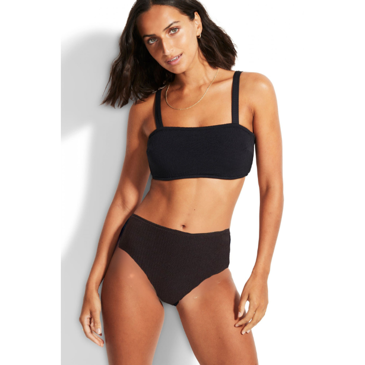 Take your beach look to the next level with the Sea Dive DD Cup Bikini from Seafolly. This glam 70's inspired look features luxe shimmering fabric in classic colors like black and white, plus two seasonal hues. The DD Bandeau Bra offers a comfortable, supportive fit, while the Wide Side Retro bottoms give you a pop of glam. It's swimwear made for making waves!     31206DD861/40586
