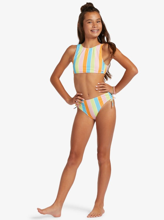 Ready to hit the beach or the pool? Our In Paradise Two Piece Crop Girls' Bikini will have your girl stand out from the crowd in the cutest way possible! Made with recycled and chlorine-resistant fabric, this cute bikini top is a pullover crop with a knotted drawstring and the bottoms are full coverage with side ties. From splashes of color to floral and tropical prints, this Last Paradise bikini set has all the fun-in-the-sun vibes!