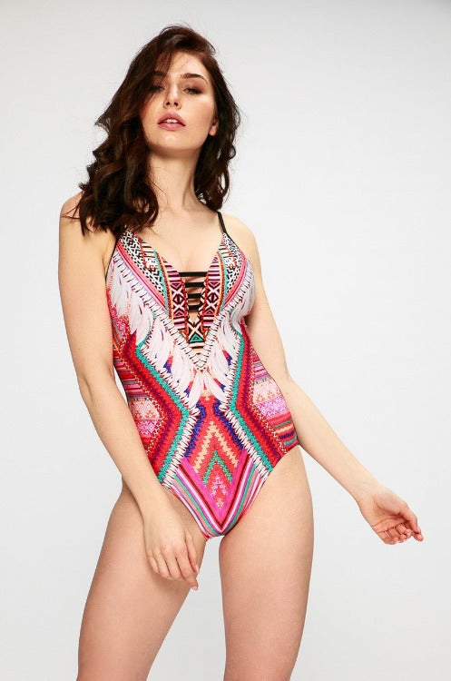 Get ready for a ‘turbocharged’ swim season with the Desert Tribe Deep V One Piece! This fashionable one-piece comes with removable cups and adjustable straps so you'll have a perfect fit. The ladder details provide additional support and style. Best of all, it’s recommended for cup sizes A-C — you can’t go wrong!    10782185