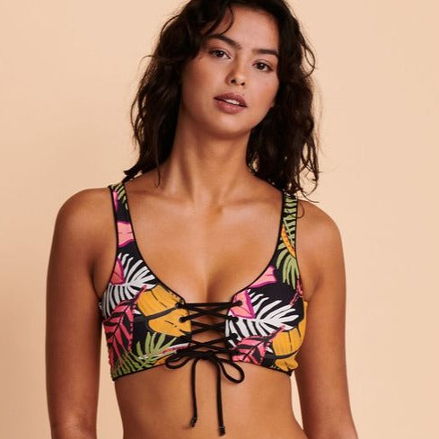 Splash into summer with this eye-catching Maaji swimsuit! The reversible black and tropical two-piece is designed with a jaw-dropping lace-up v-neck bralette and high-waisted cheeky bottom, meaning you can rock it four different ways. Let the fun begin!