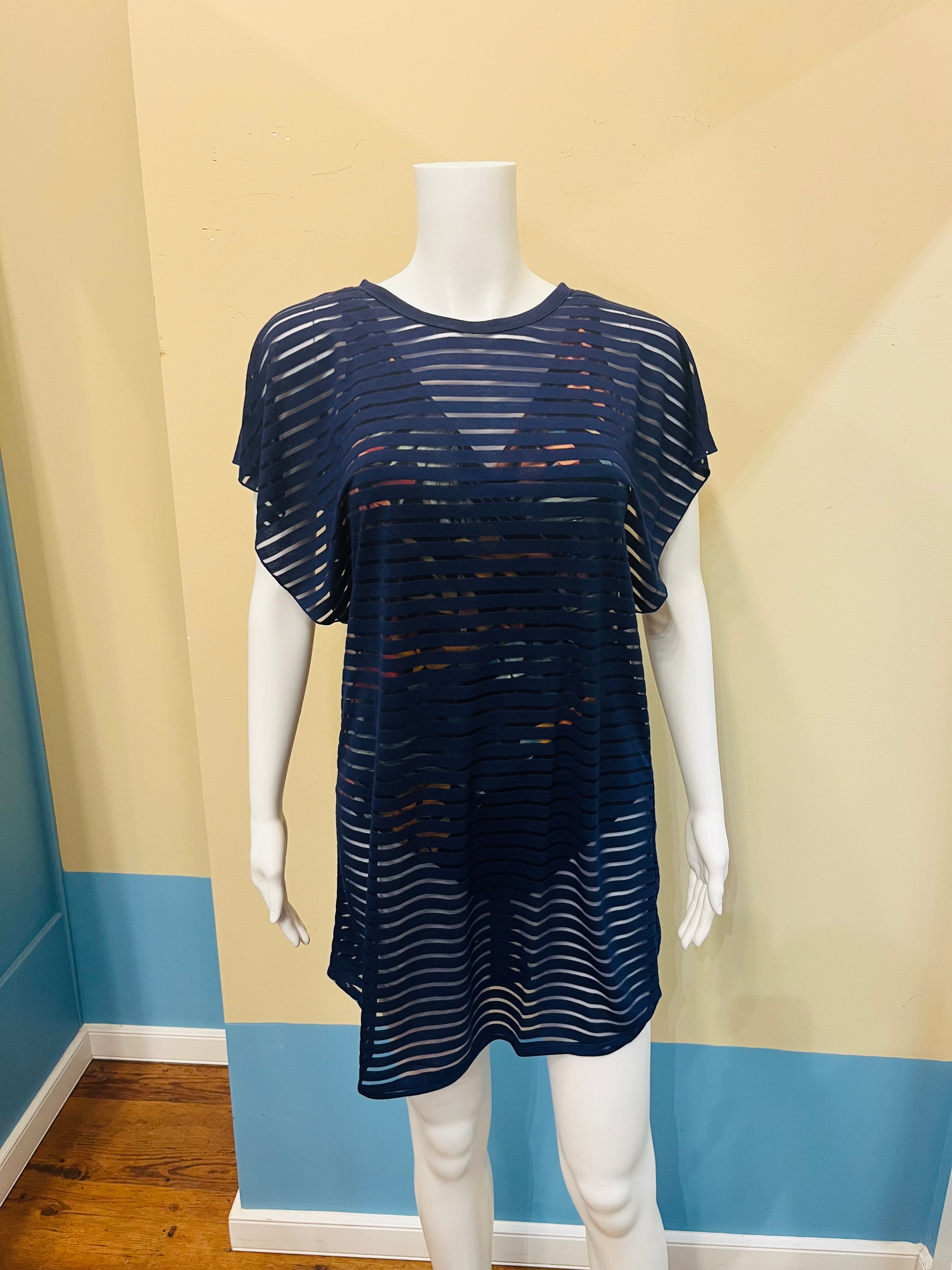 This easy breezy bat wing tunic swimsuit cover up up is so light weight its perfect for those hot summer days. The fabric is soft and feel luxurious against you skin. Wear this classic take on a cover up poolside, lounging on the cruise deck. Bon voyage!