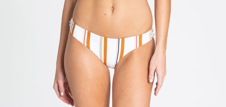 Make a statement in the Sunstruck Off-Shoulder Bikini! Dream of summery days spent lounging on a white sand beach with this serape-style striped two-piece. Keep cool under the sun with the fun, off-the-shoulder top featuring a sassy lace-up center. Ready to heat up your vacay style? Sizzle away with this lightweight swimwear!