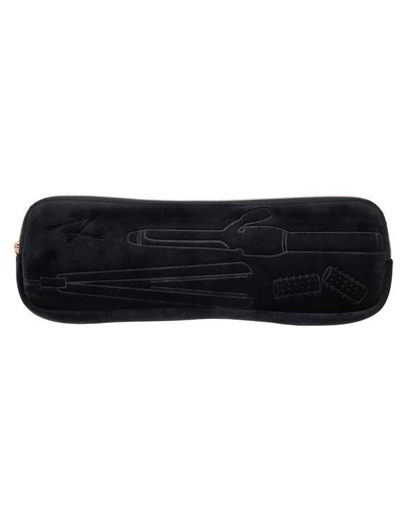 Take your hair care routine wherever you go with the MyTagAlongs Vixen Hair Tools Caddy! This nifty caddy is the perfect stash spot for your flat irons, curling wands, or curlers, and it's perfect for when you're at home, at the gym, or on the go! Keep your heat styling tools safe and secure no matter what your destination, and don't forget you can also use it as a flat iron cover. Get organized and stylish wherever you may roam!