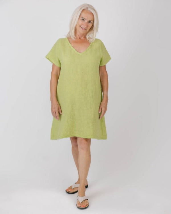 Look effortlessly stylish and unique with the Peggy Dress! Featuring a flattering v-neckline, a flirty handkerchief hem, short sleeves, and convenient pockets, this dress is sure to turn heads. Get ready to feel the envy of the crowd!        5069