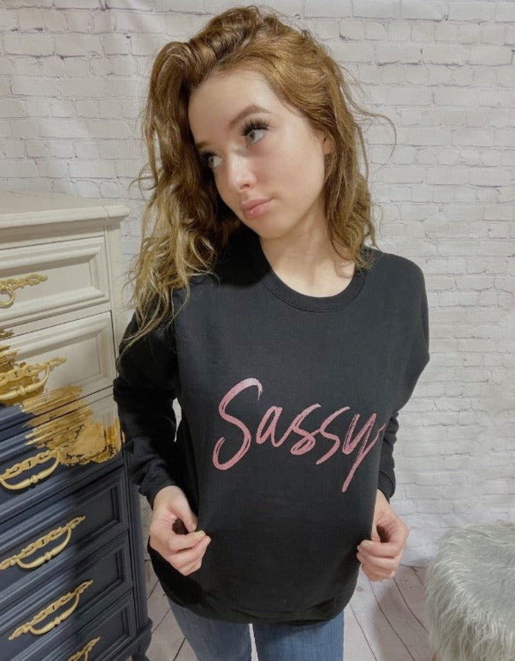 Where are my SASSY babes at!? This sweater has all the attitude plus the ultimate cozy factor. It is a relaxed oversized cut so we suggest sticking to your true size. Fuzzy lined and the perfect polyester/cotton blend to keep you cool in the summers and warm in the winter.