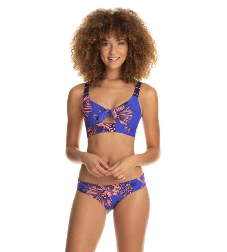 Make waves and turn heads in this Carnival Funfair Bikini Set by Maaji! Featuring a pull-over bralette bikini top with removable pads, a peek-a-boo cutout, and adjustable shoulder straps, this set lets you enjoy life in style and with loads of laughs! Plus, you'll get a Maajical surprise when you flip it inside out! Time to go have some fun!