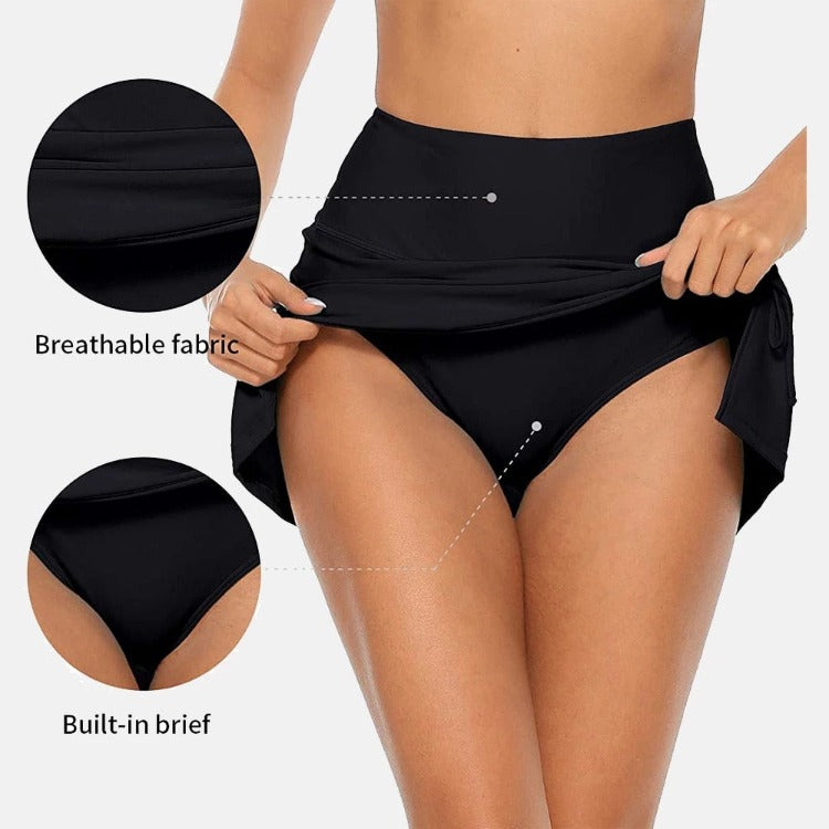 Feel the tennis court skirt in this swim skirt by Charmo. Wide band for tummy control and a adjustable split drawstring allowing you to adjust the length short to long on the slit. Length is mid thigh and comes with a modest coverage bikini panty underneath. 