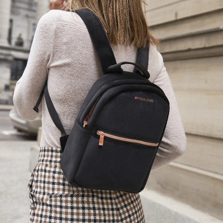 Our Mini Vixen Backpack is the total package – fashionable and practical! Crafted from premium neoprene and velour for a chic look, it’s perfect for everyday use and travel. With a spacious mesh compartment, a front zipper pocket, and adjustable padded straps for comfy carrying, you’ll stay stylish and organized on all your adventures!