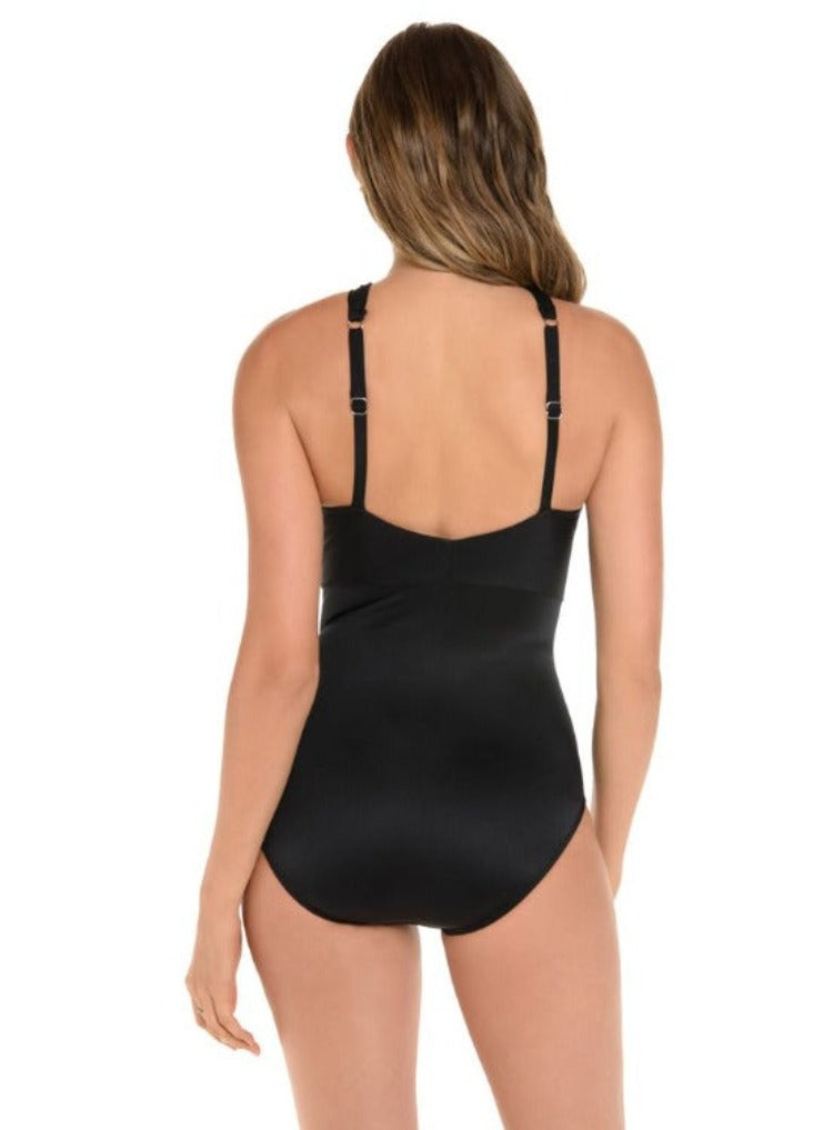 Look nothing short of a miracle in this season’s stunner: the Embrace DD One Piece! With an intricate halter neckline and a sexy little mesh cutout, you’ll be feeling divine from breast to back. A hidden underwire and adjustable straps make for a comfortable, supportive fit, while the solid black bottom ensures every curve is concealed and “tamed” perfectly. Ahhh, miracles do exist!