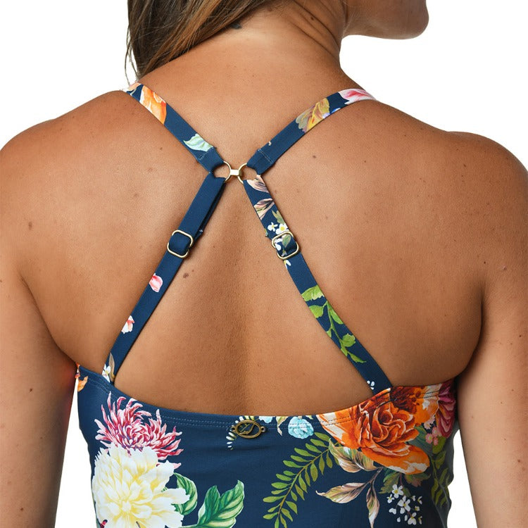 Our Floral Enchantment Cami Tankini Top is a tank-style teatime companion with adjustable straps for customized cozyness and squeezable cups for added structure. The straps are fastened for extra delight and fashionability. Tankini Top Adjustable straps Removable cups UPF 50 Sun Protection Buttery Soft Fabric
