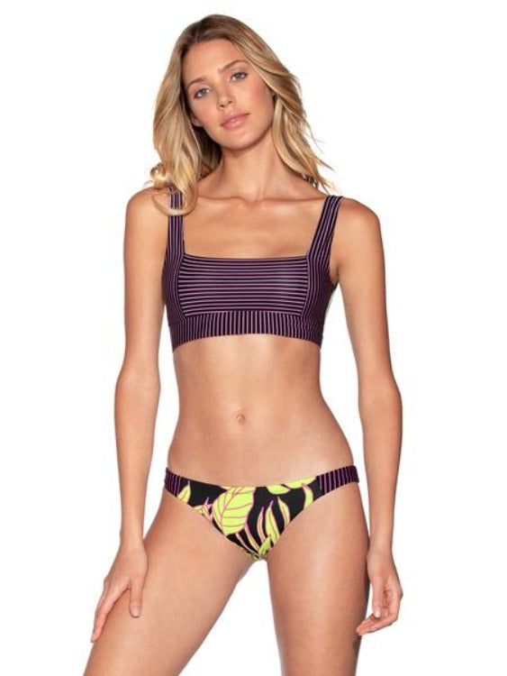 This flirty, low-rise hipster bikini with an utterly stunning, structured square-neck top is totally reversible with an eye-catching combination of stripes and tropical patterns. We're drooling over the mix of radiant purple and vibrant neon green. Effortlessly switch up your seaside style with this reversible bikini top boasting a sporty silhouette and an open back. Flipsi-doosy! (Removable soft cups, clasps at back and pattern of reverse side may vary.)