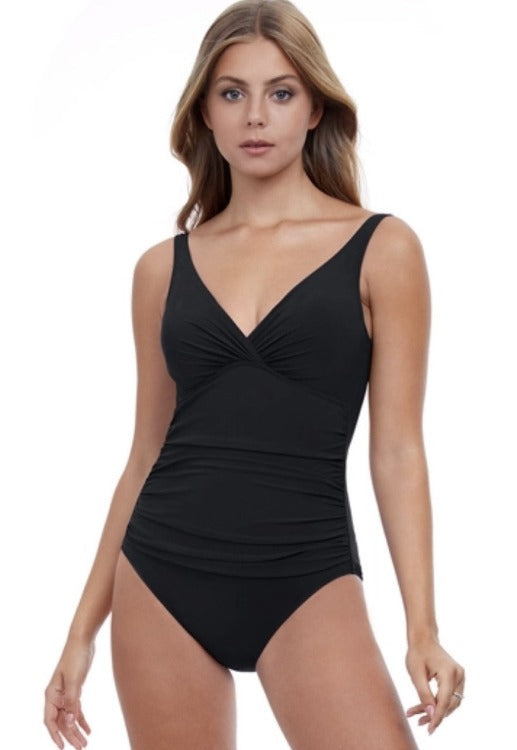 Treat your body to a luxurious dip in the "Tutti Frutti" - a stunning one-piece swimsuit that flatters every profile! Specially designed to slim and shape, with a hint of twist front wrapping for extra support and confidence, this UV-protected suit is a must-have for beach days and pool parties. Get ready to dazzle in your new favourite!      ETT2089