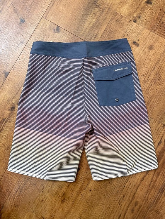 Seize the day with our SurfSilk Boardshort! Durable performance fabric is comfy on the inside and resilient on the outside, plus made from recycled plastic bottles. With a plant-based hydrophobic coating and a youth length fly closure, they’ll be ready to rally when surf’s up! (Surf's up, dude!).    EQBBS03675 