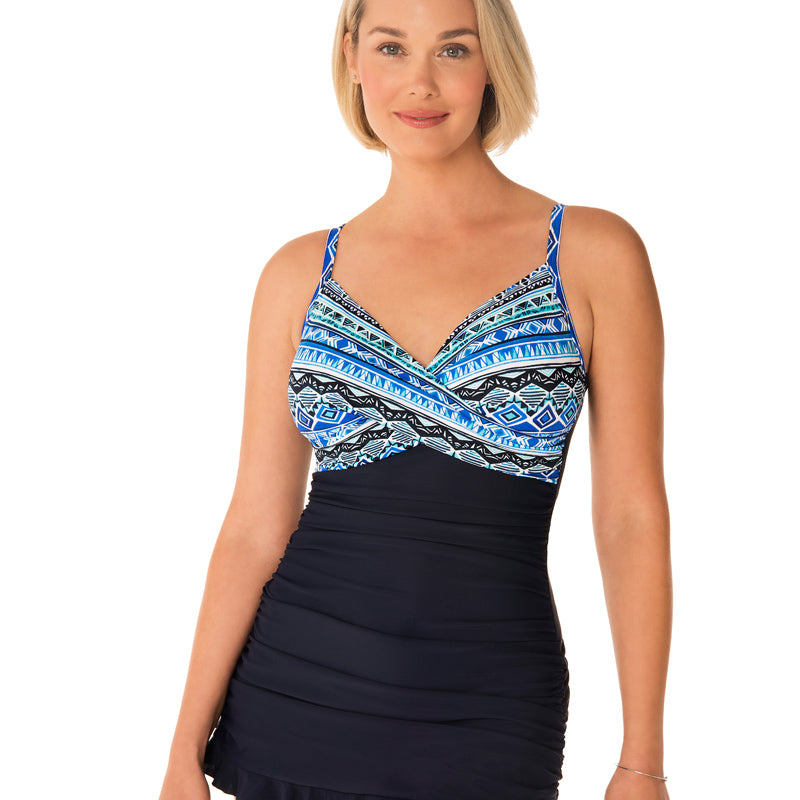 Look smoking' hot in this Crisscross Swim Dress! With a V-neck and tummy control ruching, it'll hug your curves and keep you feeling confident and secure. Plus, it features adjustable straps and a scoop back, allowing you to customize your fit for as long as you're soaking up the sun. Summer ain't never looked better!