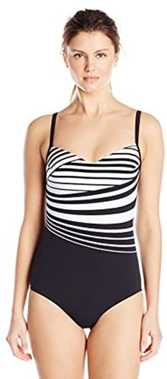Make a splash in the Striped D Cup One Piece—a fierce swimsuit that all your squad will swoon over! Boasting thick straps with loop details, built-in cup inserts, a sweetheart neckline, and a scoop back, this Mod-style suit will hug your curves in all the right places. With its classic cut bottom and contrasting black and white stripes, you'll make a statement at the beach or poolside. Get ready to own the scene—literally!