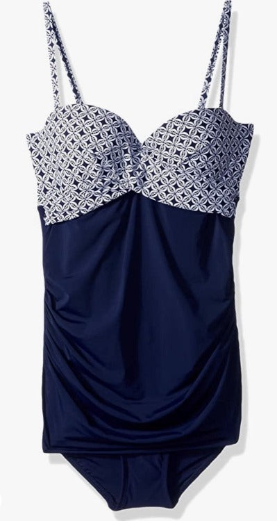 Make a splash in this stylish bandeau swim dress from Christina! Its flattering construction and ruching on the sides make all your curves look their best. Plus, the molded cup and side boning provide extra support for A-C cup gals, and adjustable straps can be removed for a strapless look - you got it, girls! Now roll up to the pool and show off your swerves!
