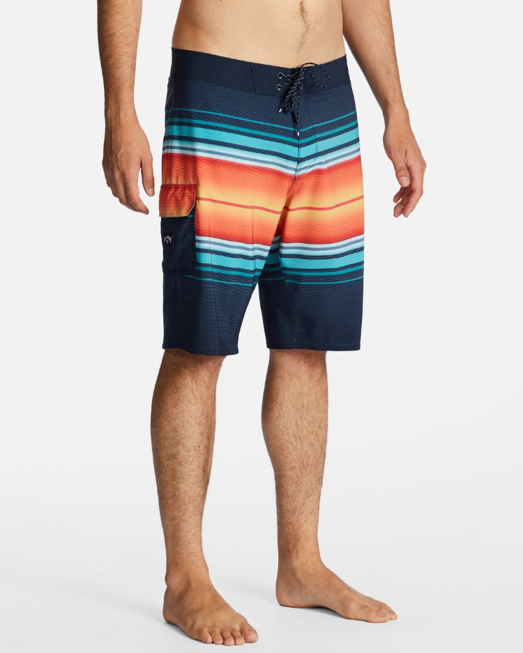 The All Day Stripe Pro Performance Boardshort will have you shredding waves in style! This short may look good, but it's extra functional - made with recycled surf fabric for superior stretch and lightweight comfort. Get ready to ride the wave of sustainability in style! 