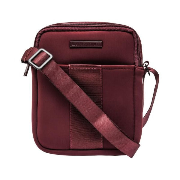 The Everleigh Crossbody Bag is the perfect accessory for your active lifestyle! Crafted from Lycra Neoprene fabric, it's comfy yet chic - plus, it's fitted with a crossbody strap, interior zippered pocket and exterior slit pocket, so you'll be able to fit all your small essentials in without taking up too much space! (It's like a magic trick!) Now watch your day unfold with freedom and style!