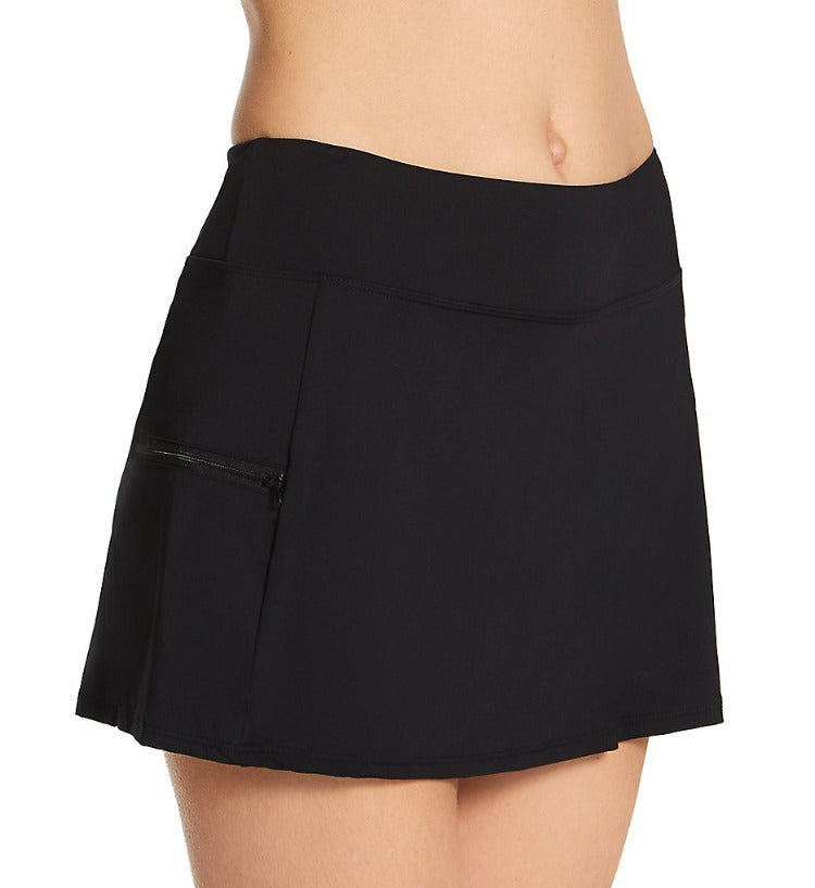 Being stylish while you surf has never been easier with the Emma Swim Skort! This fun and sporty number pairs a stylish skirt with snug fitting under shorts for unparalleled coverage and flattering looks. For all the beach-goers, don't worry about lugging around a purse-- we've got you covered with a zippered pocket for your keys and cash. Your swimwear never looked so fashion-forward!