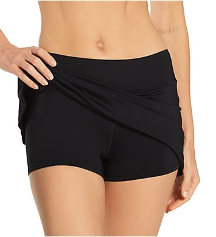 Being stylish while you surf has never been easier with the Emma Swim Skort! This fun and sporty number pairs a stylish skirt with snug fitting under shorts for unparalleled coverage and flattering looks. For all the beach-goers, don't worry about lugging around a purse-- we've got you covered with a zippered pocket for your keys and cash. Your swimwear never looked so fashion-forward!
