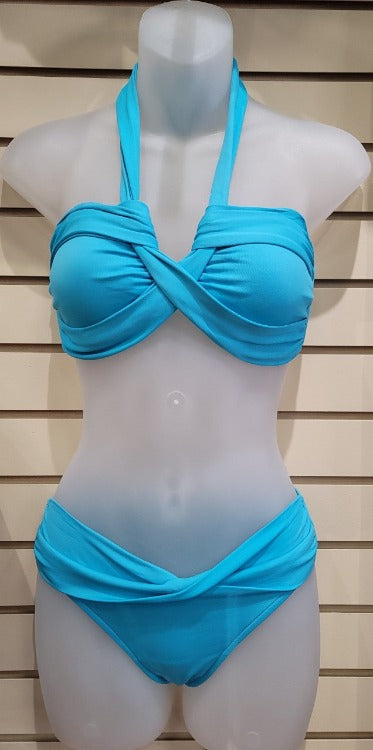 Dive into summer in style with Seafolly's Bandeau with Twist Band Hipster Bikini Set! This classic swimsuit is designed to offer superior comfort and flattering fit for a charming beach look. Be worry-free and feel confident in its supportive boning and gripper tape, perfect for a B-C cup. Plus, look trendy in its twist band details! Make waves with this timeless beauty!    3816065/4320065