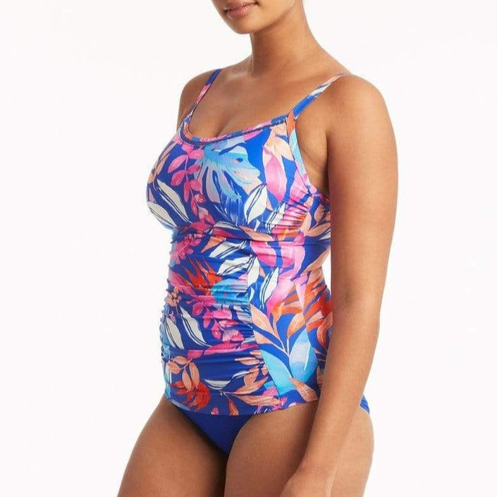 Make a splash this season with the Sea Level Cabana Tankini in eye-catching cobalt! Enjoy the sun in style with this innovative, adjustable & convertible, flattering fit tankini. With powermesh support in the front and back, removable soft cups, hidden underwire, side boning, and a gathered side high waist pant, you'll look and feel your best! And with a stretch ladder trim, you're sure to be the hottest beachgoer around!     SL3453CA/4140