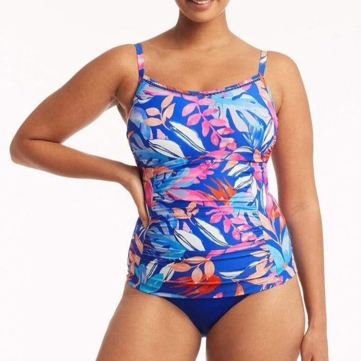 Make a splash this season with the Sea Level Cabana Tankini in eye-catching cobalt! Enjoy the sun in style with this innovative, adjustable & convertible, flattering fit tankini. With powermesh support in the front and back, removable soft cups, hidden underwire, side boning, and a gathered side high waist pant, you'll look and feel your best! And with a stretch ladder trim, you're sure to be the hottest beachgoer around!     SL3453CA/4140