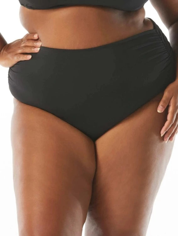 Love the height of a high waistline but want the freedom to switch things up? Got a sense of style and need a bikini bottom that's both versatile and fashionable? Coco Reef's Impulse Roll Down Bottoms are the answer! Roll 'em up or down - it's totally up to you! With a classic black hue, this stylish cut goes with any top - ready to show your fashionista commitment to flexibility and style? Let 'er roll! Convertible Bikini Bottom High or Low Rise Choice Full Coverage Fully Line.